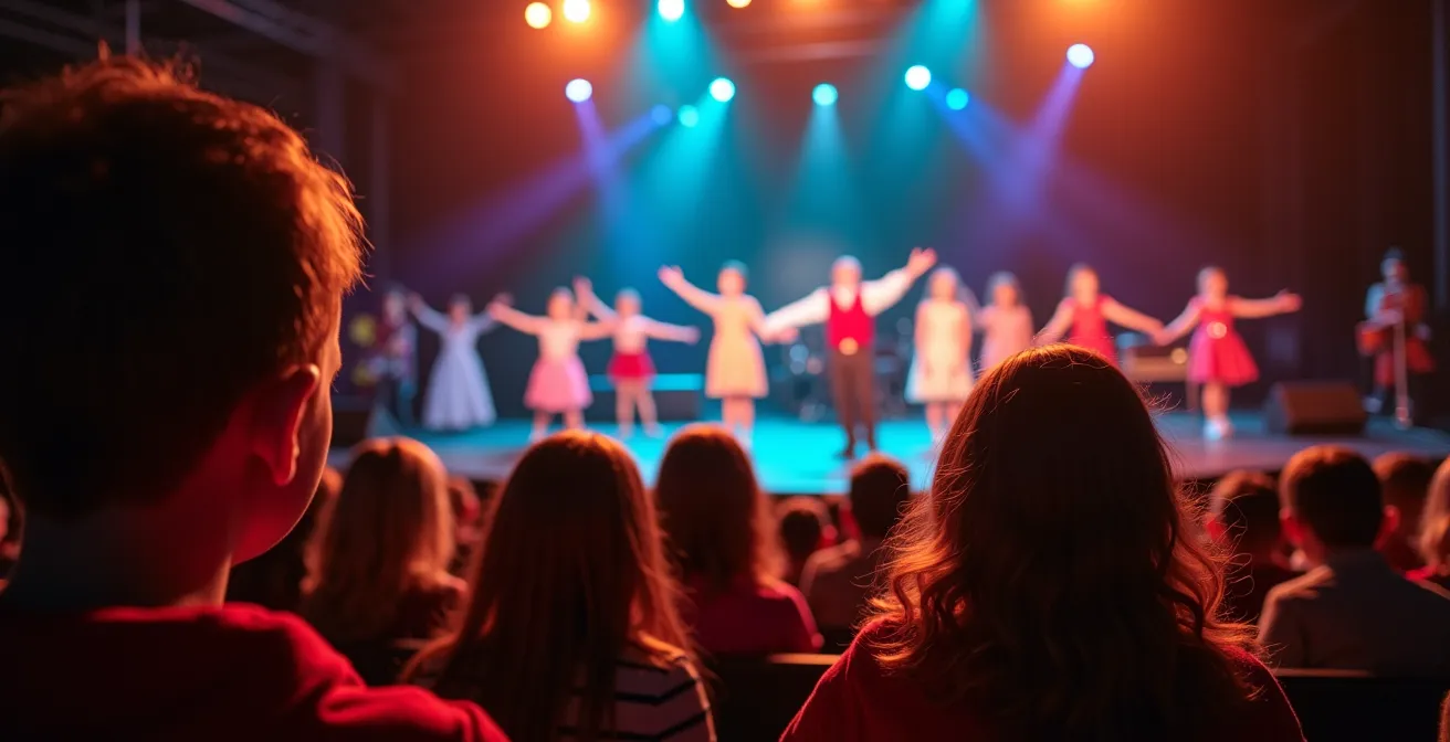 Photographie illustrant un spectacle de Noël mélangeant danse, musique et magie sur scène devant un public mixte